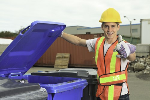 Supervisor conducting a site safety check before waste collection