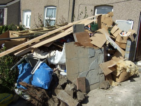 Expert team assessing clearance items in an Oxford home